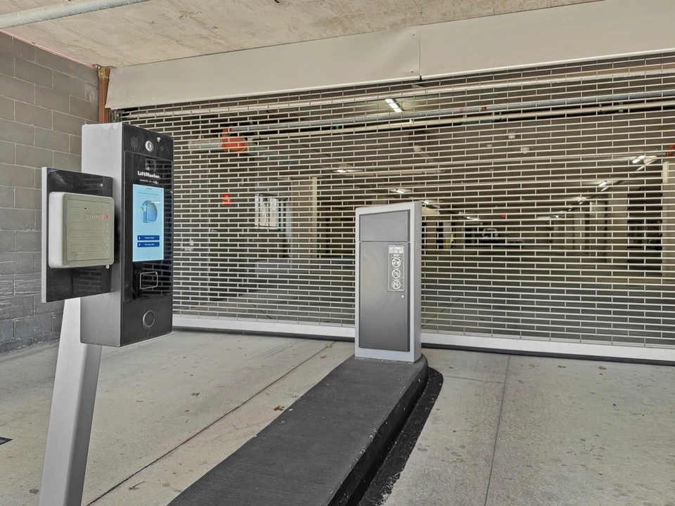 Parking garage entry gate and keypad